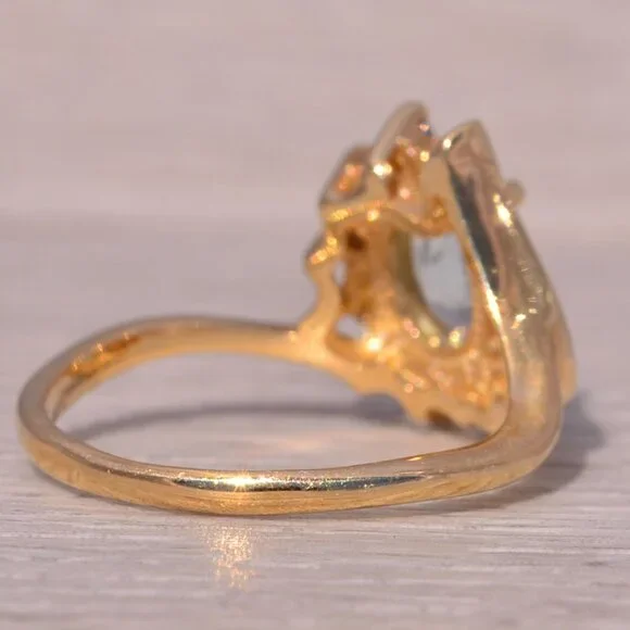 Aquamarine and Diamond Ring in 14 Karat Gold